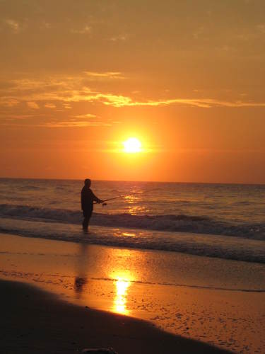 Ocean Fishing At Sunrise